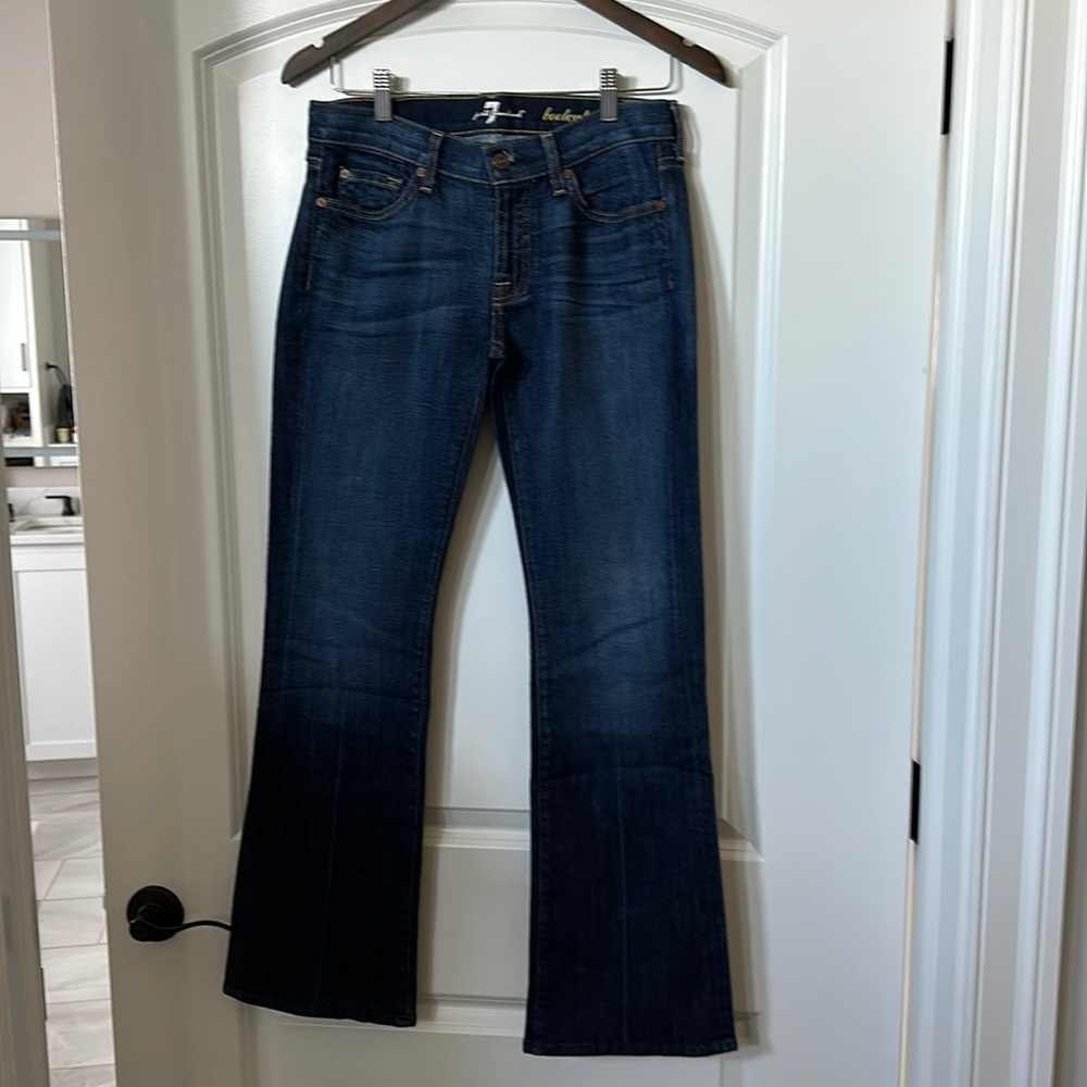 Bootcut, Midwaist Jeans by 7 for all mankind. Dark wash